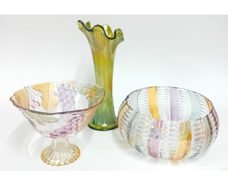 Two Orrefors coloured glass bowls, one raised and decorated with grapes and strawberries, together with a Carnival green and 