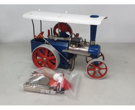 An unboxed Wilesco live steam Traction Engine with a box of solid fuel tablets, oil and funnel, Ex