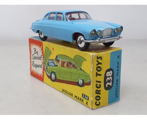 A boxed Corgi Toys No.238 blue Jaguar Mk.10, Ex box VG-Ex