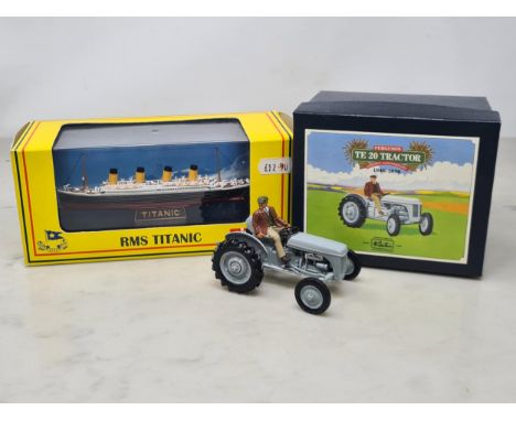 A boxed Britains 8711 Ferguson TE20 Tractor and a boxed Gilbow RMS Titanic Model