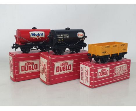Three boxed Hornby Dublo 2-rail Wagons including 4680 black 'Esso' Tank, 4677 'Mobil' Tank and 4660 'United Glass Limited', a