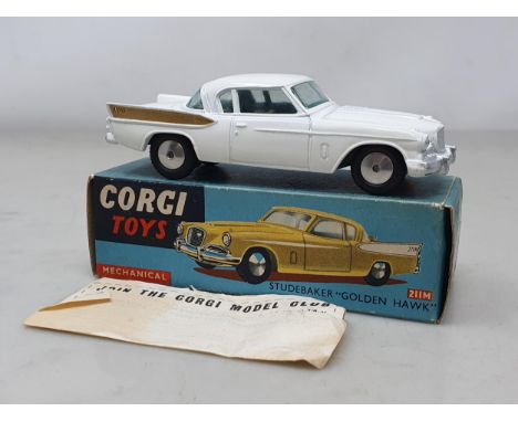 A boxed Corgi Toys No.211M white Studebaker Golden Hawk, Nr M-M, box VG-Ex