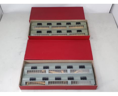 A boxed Hornby Dublo 5005 Engine Shed and boxed 5006 Engine Shed Extension Kit, both appear complete, Ex plus, plain red boxe
