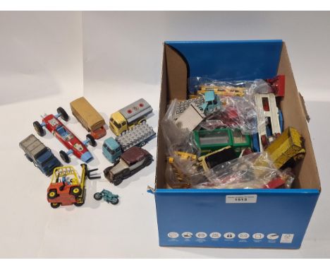 A collection of unboxed play worn Corgi, Matchbox and Budgie Vehicles including Cori Car Transporter, two E.R.F. 44G Lorries 