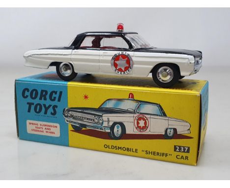 A boxed Corgi Toys No.237 Oldsmobile 'Sheriff' Car, Nr M-M, box superb