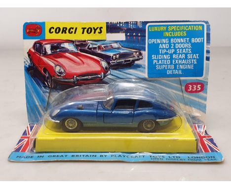 A boxed Corgi Toys No.335 blue Jaguar E-type in blister pack, Ex, box Ex plus