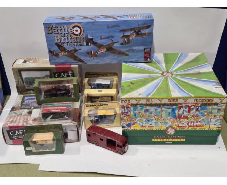 A boxed Corgi South Downs Gallopers Merry go Round (no packing inside the box), two boxed Corgi Cafe Connections Models, an O