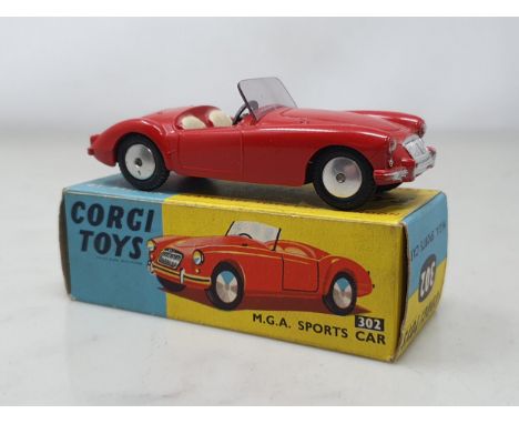 A boxed Corgi Toys No.302 red M.G.A. Sports Car, M, box Nr perfect