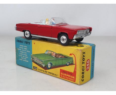 A boxed Corgi Toys No.246 red Chrysler Imperial, Nr M-M, box Ex plus