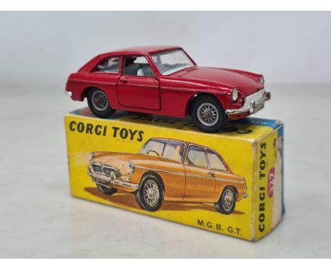 A boxed Corgi Toys No.327 M.G.B. G.T., Ex plus, box VG (tape tear to end flap)