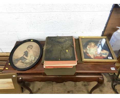 An oval print, a photograph folio and an oil, portrait of a young lady and child