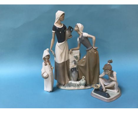 Two Lladro figures and a Nao group of two ladies by a fountain