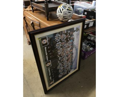 A signed Newcastle United football and a signed print dedicated to 'The Ferry Tavern'