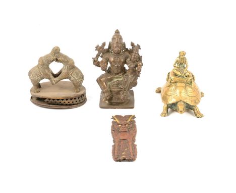 Indian Bronze group, Lakshmi and Vishnu, 11cm; bronze group of performing elephants, damaged; cast brass model of a giant tur