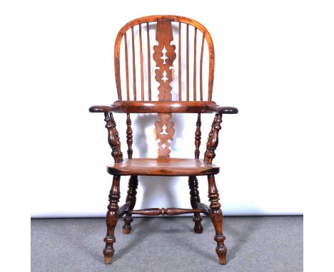 Victorian elm and yew broad arm Windsor chair, high back with Christmas tree splat, shaped seat, turned support, H-stretchers