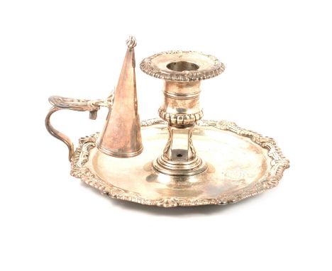 Regency silver chamber stick, S C Young &amp; Co., Sheffield 1813, reel sconce, shallow circular drip-pan, with a cast scroll