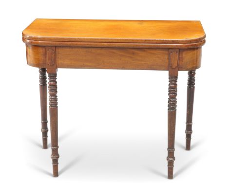 A VICTORIAN MAHOGANY FOLDOVER TEA TABLE, with rounded corners, raised on ring-turned tapering legs. 76.5cm high, 91.5cm wide,