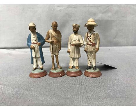 FOUR CERAMIC FIGURES RELATING TO INDIAto include Mahatma Ghandi; and a British officer (4)