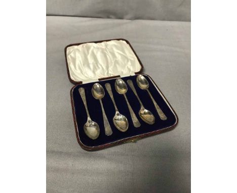 SET OF SIX SILVER COFFEE SPOONSin case also a silver pickle fork and a set of six plated fish knives and six forks, in case