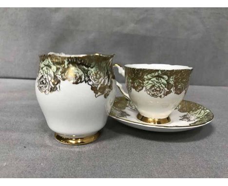 ROYAL STAFFORD GILT AND GREEN DECORATED TEA SERVICE along with a glass vase and other glass ware 