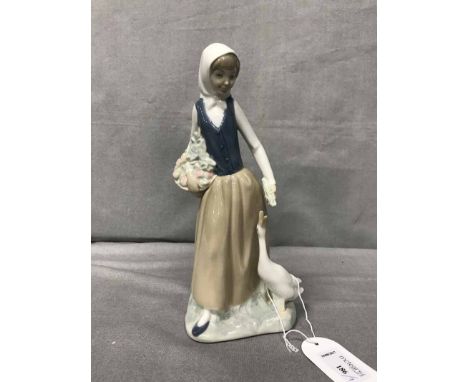 LOT OF FOUR NAO FIGURESincluding a Lladro figure, a Beatrix Potter figure and a Royal Worcester mob cap