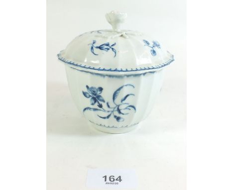 An 18th century Worcester blue and white fluted sucrier and cover, painted Gilly flowers, with flower finial and W mark to ba