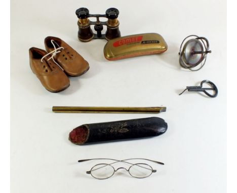 A box of collectables including leather children's shoes, Hohner harmonica etc