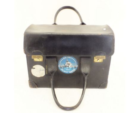 A Monarch Airlines vintage pilots leather flight bag with contents, maps, photographs etc