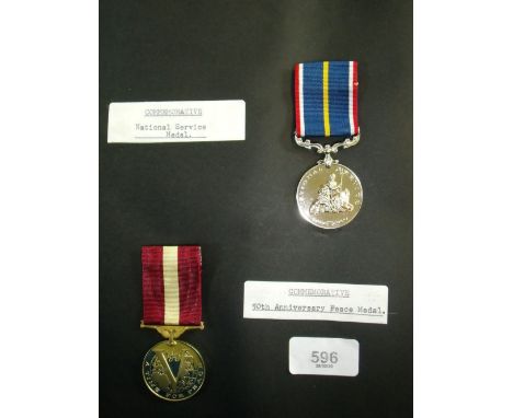 A folder containing WWII medals and entitled 'This Is Your Army Life 16/2/40 to 13/5/46' - pertaining to the service of Staff