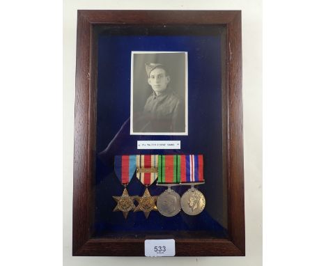 A WW2 four medal group awarded to Pte Walter George Simms:- 1939 - 1945 Star, Africa Star with 1st Army clasp, Defence medal 