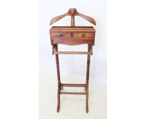 A modern mahogany valet stand with drawers