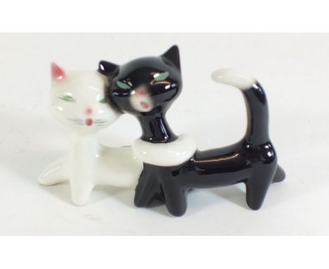 A Goebel group of two stylised cats