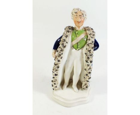 A 19th century Staffordshire figure of Prince Albert in blue cloak