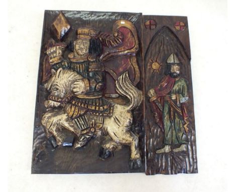 A heavily carved panel depicting man on horseback 62 x 39cm and another smaller of soldier in cloak 62 x 20cm