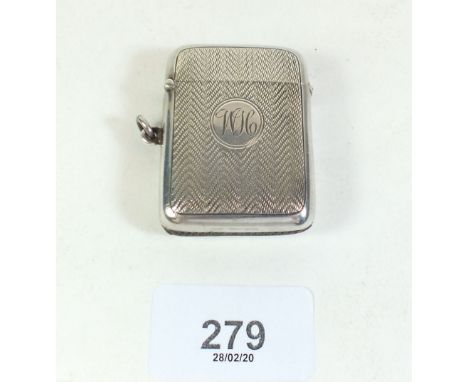 A silver engine turned vesta case with gilt interior Birmingham 1921 46g
