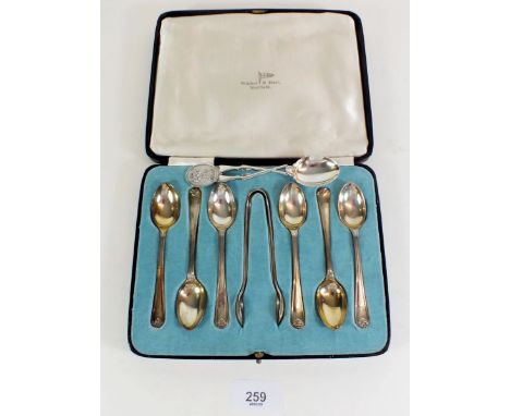 A set of six silver Walker and Hall teaspoons and tongs, circa 1938 - cased, and a silver shooting prize spoon