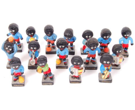 A collection of 15x loose Golliwog miniature figures playing sports and various instruments. 