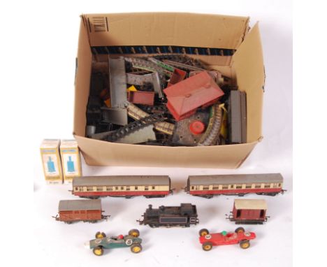 A collection of assorted Triang trains &amp; track to include; carriages, various parts of train stations, straight &amp; cur