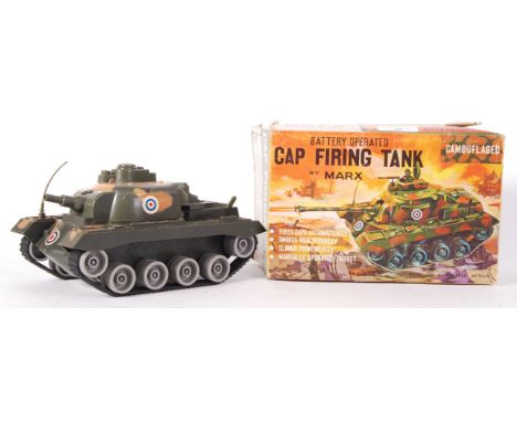 An original 1960's Marx battery operated Cap Firing Gun within its original box.&nbsp;