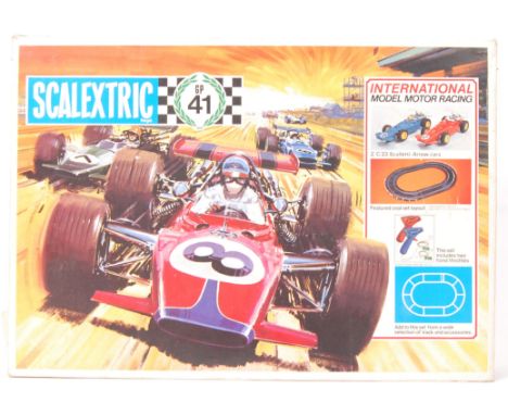 An original retro 1970's Scalextric 'Gp 41' set within its original box. Appears complete with cars, controllers etc.   