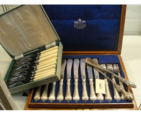 A cased canteen of cutlery by Mappin & Webb; together with HM silvered collared fish knives, a HM silver shoe horn and button