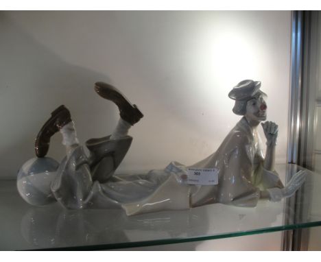 A Lladro figure of a recumbent clown, 4618