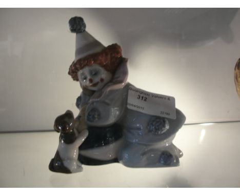 A Lladro figure of a clown on ball with puppy