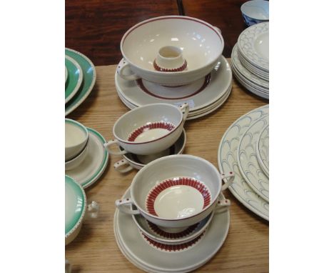 A quantity of Susie Cooper burgundy/beige soup bowls and plates etc