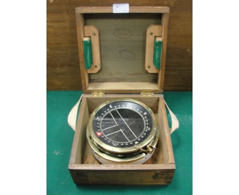 A ship's compass having brass surround, the side bearing a brass plaque and below a crown, Ref 60/674