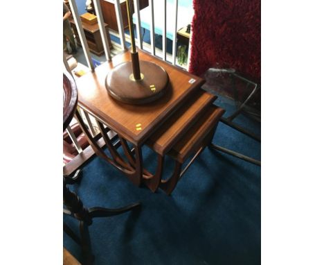 A teak G Plan nest of tables and a teak standard lamp
