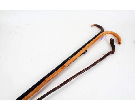 Horn handled walking stick, two other walking sticks, poker (4)