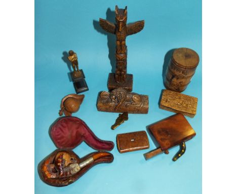 A treen snuff box, a pipe, the bowl in the form of a bird's claw, and similar items