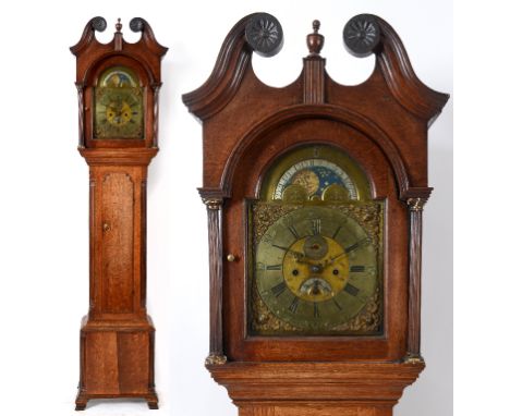 A longcase clock, the 30 cm square brass arched dial having Roman numerals, subsidiary seconds dial, date aperture and phase 