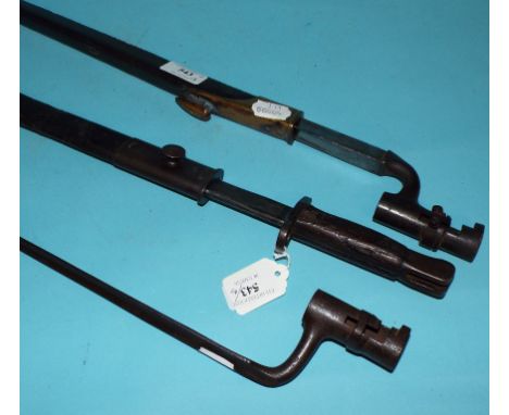 A late Victorian bayonet, with scabbard, another similar, and another bayonet, dated 1907, and scabbard (3) Condition report 